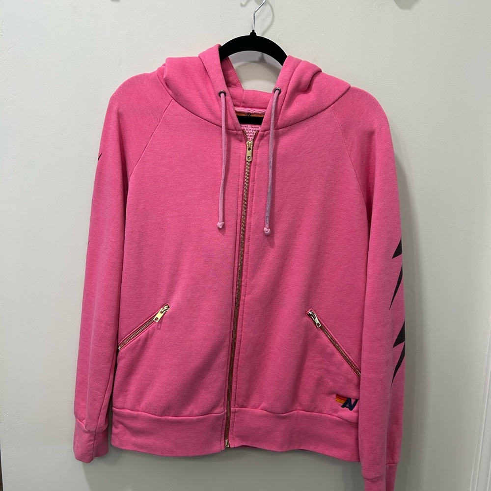 Aviator Nation pink zip ip sweatshirt- medium. Pink/gold, black lightening bolts